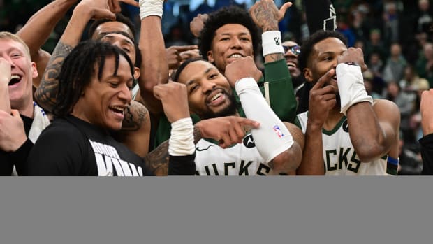 Milwaukee Bucks players celebrate Damian Lillard’s game-winning shot with the ‘Dame Time’ celebration.